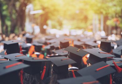 lot of graduates crowd together