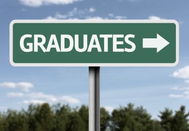 Graduates sign Graduates sign