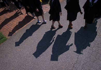 Shadows of graduates at liberal arts college US Shadows of graduates at liberal arts college US