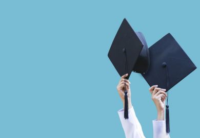 Graduation caps thrown