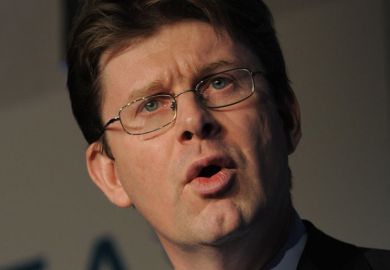 Greg Clark speaking at conference