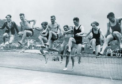 People jumping over tennis net