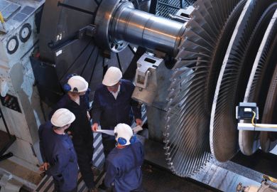 Group of engineers in discussion