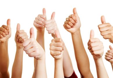 Group of hands with thumbs-up