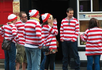 Group of identically-dressed tourists sightseeing in Dublin