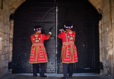 Two Yeoman Warders closing doors Two Yeoman Warders closing doors to illustrate whether Labour want more people to go to university