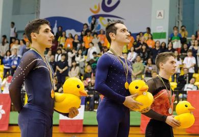 gymnasts-holding-ducks gymnasts-holding-ducks