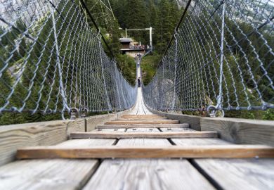 Handeggfallbrücke, a pedestrian bridge located in the heart of the Swiss Alps