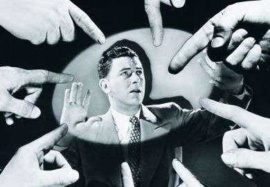 People pointing fingers at guilty-looking man