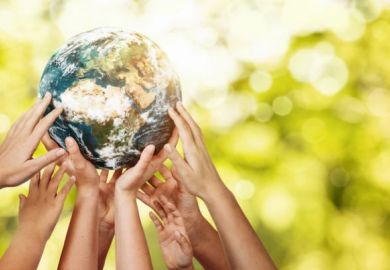 Hands holding up Planet Earth, commitment to United Nations SDGs, THE Impact Rankings 2021 blog