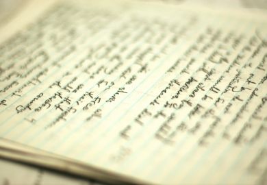 Handwritten essay on table Handwritten essay on table