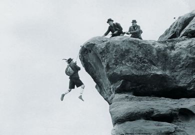 hanging from cliff face
