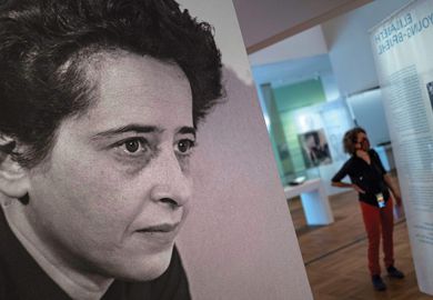 A photograph of German-American philosopher and political theorist Hannah Arendt (L) is on display during a press preview of the exhibition “Hannah Arendt and the Twentieth Century” at the German Historical Museum
