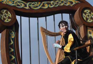 Irish harp player at St Patrick’s Day Parade in Dublin to illustrate Ireland’s search for global research talent Irish harp player