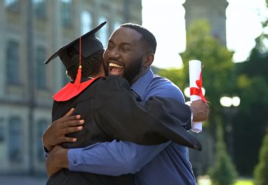 istock historically black universities A cheerful father and graduating son hugging