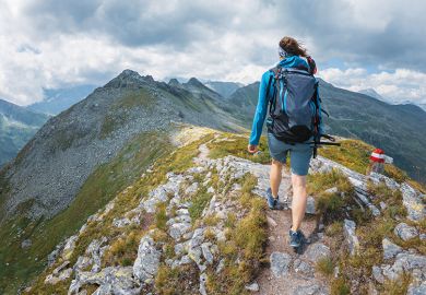 woman hiking to illustrate taking time out