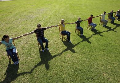 Holding hands in chairs