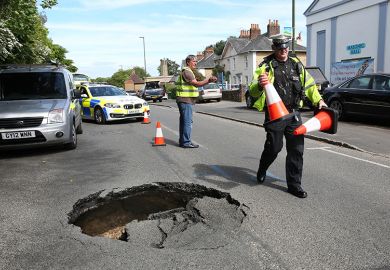 Police and workers put cones around sink hole in road. To illustrate that ResearchPlus must carve out a distinctive niche to avoid falling into the pitfalls of its predecessors.