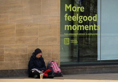 A homeless man begging with a sign next to him advertising “more feelgood moments”. To illustrate that universities are being asked to commit to break down barriers to opportunity and support the government’s mission to drive growth A homeless man begging with a sign next to him advertising “more feelgood moments”. To illustrate that universities are being asked to commit to break down barriers to opportunity and support the government’s mission to drive growth