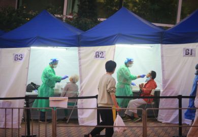 Hong Kong- March 9 2022 under the 5th outbreak of Omicron, residents are forced to examine in mobile specimen collection station