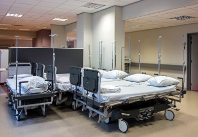 A cluster of hospital beds