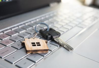 a house key on a computer