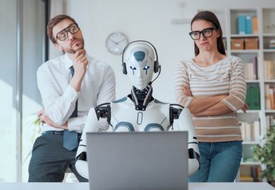 Humans look over the shoulder of a robot at a computer Humans look over the shoulder of a robot at a computer, symbolising human independent thought