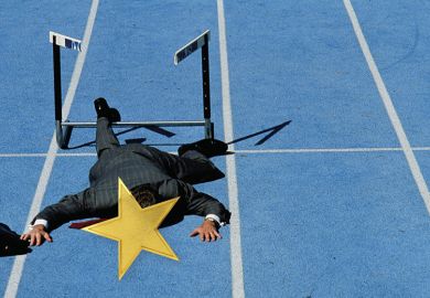 Hurdler flat on his face with gold star