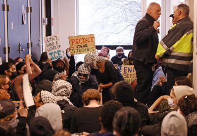 Boston University Police officers conferred with each other as students protested demanding that BU declare itself a sanctuary campus to protect students from the Federal government regardless of their immigration status, 3 April 2025