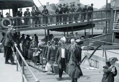 Immigrants disembarking boat, Ellis Island, New York City