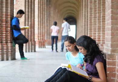 Indian students preparing for an exam Indian students preparing for an exam