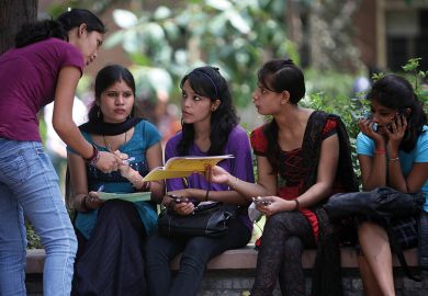 A group of female Indian students A group of female Indian students
