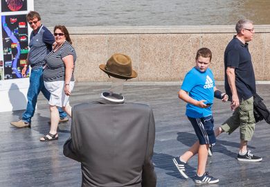 Invisible man busker, Bankside, London. To illustrate that master’s loans have been ‘forgotten’ in student debt debate.