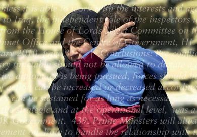 Iraqi woman holding and protecting child in front of army tanks Iraqi woman holding and protecting child in front of army tanks