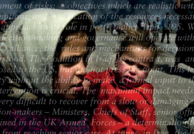 Iraqi woman holding small child