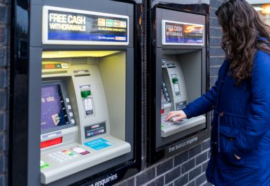 Young Adult Woman withdrew cash from ATM machine Young Adult Woman withdrew cash from ATM machine