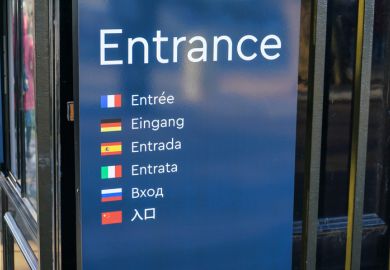 Sign reads 'entrance' in seven languages