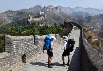 Backpacking walkers on the Great Wall of China