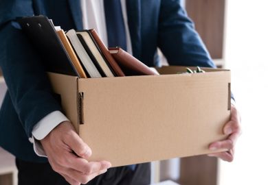 Midsection Of Man Holding Box