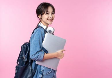 Smiling young Asian student