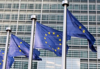 EU flags outside European Parliament building, Brussels