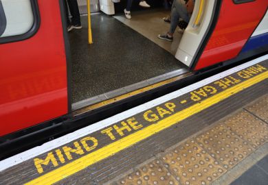 Mind The Gap warning at London Underground station.