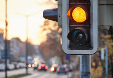 Closeup of traffic lights showing orange color