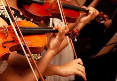 Students performing a classical music concert Students performing a classical music concert