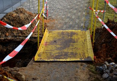 Roadworks with temporary pedestrian bridge temporary bridge