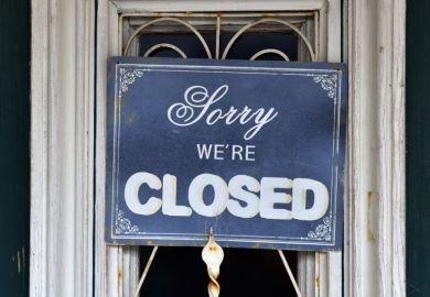 Close up of the door of a closed restaurant with a sign "Sorry we're closed" in Schörfling, Upper Austria, Austria, Europe