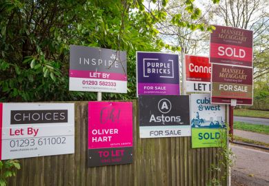 color image depicting a collection of different property for sale and sold signs in a residential district in the town of Crawley, UK. color image depicting a collection of different property for sale and sold signs in a residential district in the town of Crawley, UK.