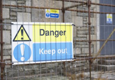 "Danger - keep out" sign on construction site