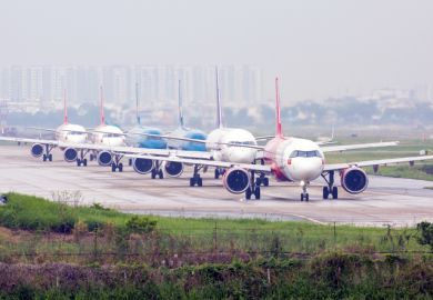 Aeroplanes queue for takeoff on runway in Ho Chi Minh City