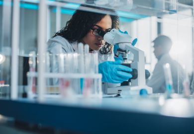 Biotechnology specialist working with advanced equipment